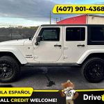 - 2014 Jeep Wrangler Unlimited Sport SUV 4D 4 D 4-D (Drive hub)