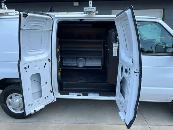 Check Out This Spotless 2014 Ford Econoline Cargo Van with 16-Charlott - $18,500 (Denver)