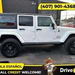 - 2014 Jeep Wrangler Unlimited Sport SUV 4D 4 D 4-D (Drive hub)