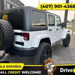 - 2014 Jeep Wrangler Unlimited Sport SUV 4D 4 D 4-D (Drive hub)