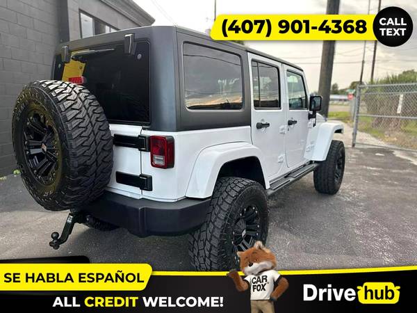 - 2014 Jeep Wrangler Unlimited Sport SUV 4D 4 D 4-D (Drive hub)