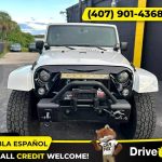 - 2014 Jeep Wrangler Unlimited Sport SUV 4D 4 D 4-D (Drive hub)