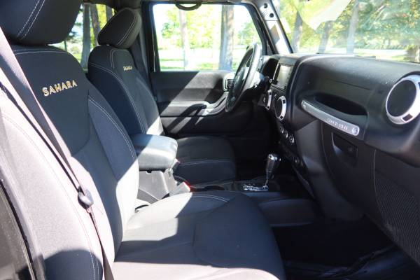 2015 JEEP WRANGLER  UNLIMITED SAHARA SPORT UTILITY 4D SUV - $25,988 (Marketplace Auto)