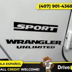 - 2014 Jeep Wrangler Unlimited Sport SUV 4D 4 D 4-D (Drive hub)