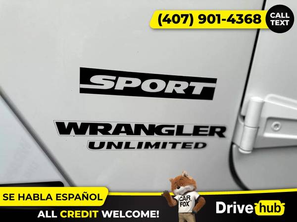 - 2014 Jeep Wrangler Unlimited Sport SUV 4D 4 D 4-D (Drive hub)