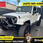 - 2014 Jeep Wrangler Unlimited Sport SUV 4D 4 D 4-D (Drive hub)