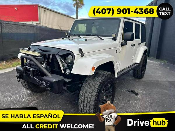 - 2014 Jeep Wrangler Unlimited Sport SUV 4D 4 D 4-D (Drive hub)