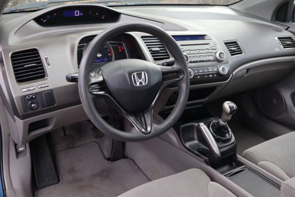 2007 Honda Civic  DX-G Coupe - $8,999 (Victory Motors of Colorado)