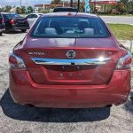 2015 Red Nissan Altima - $1,500 (longwood)